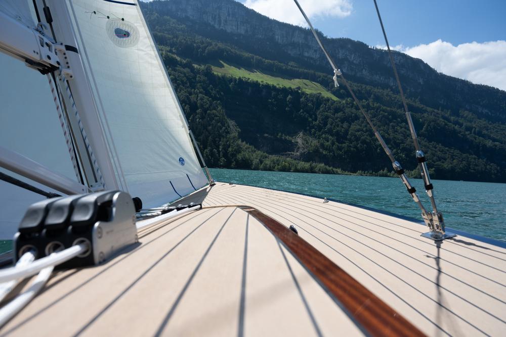 Eagle 38 daysailer sailing on a Swiss lake Permateek deck with varnished mahogany margin plank.jpg