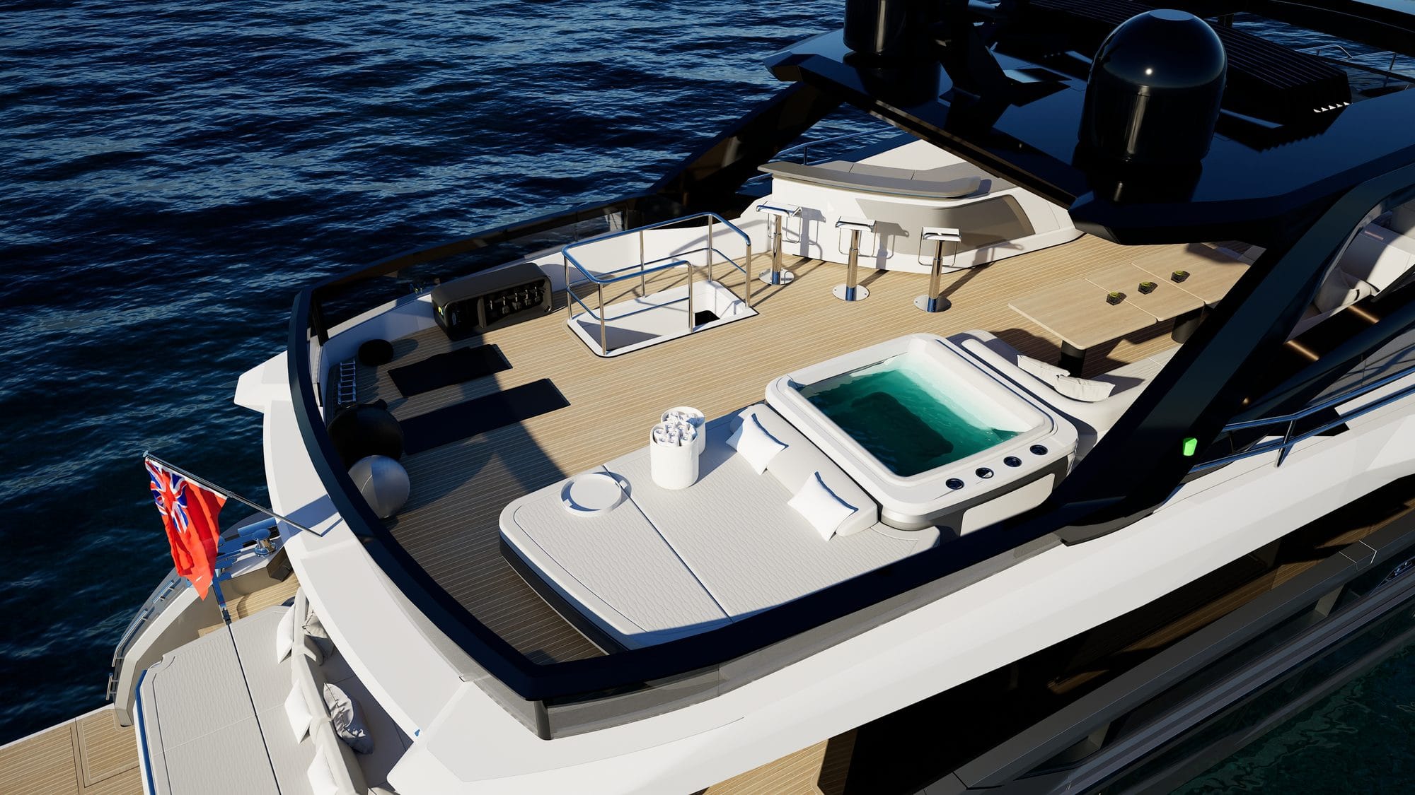 Flybridge with a spa pool and sun pads under the hardtop