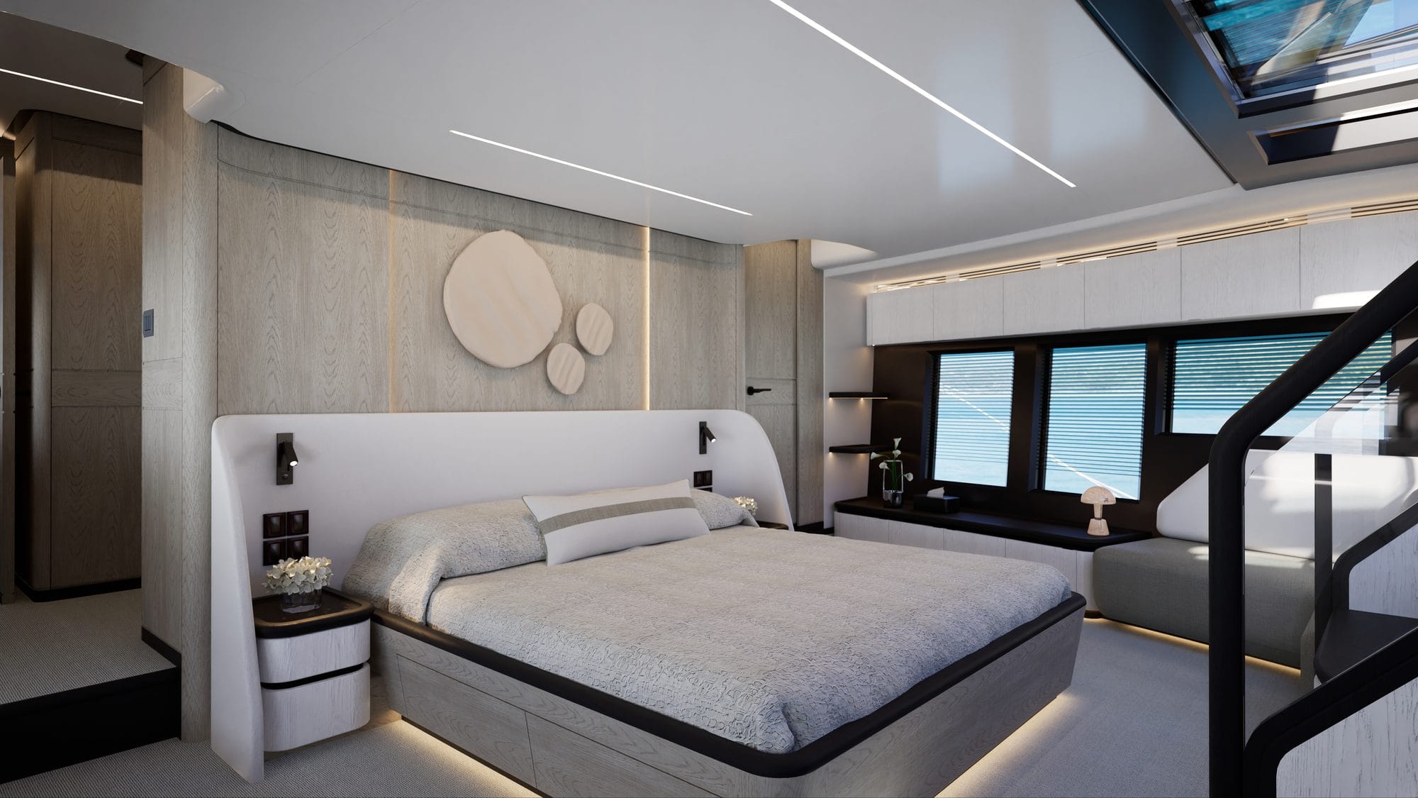Owner's suite with the bed and stairs to the main deck