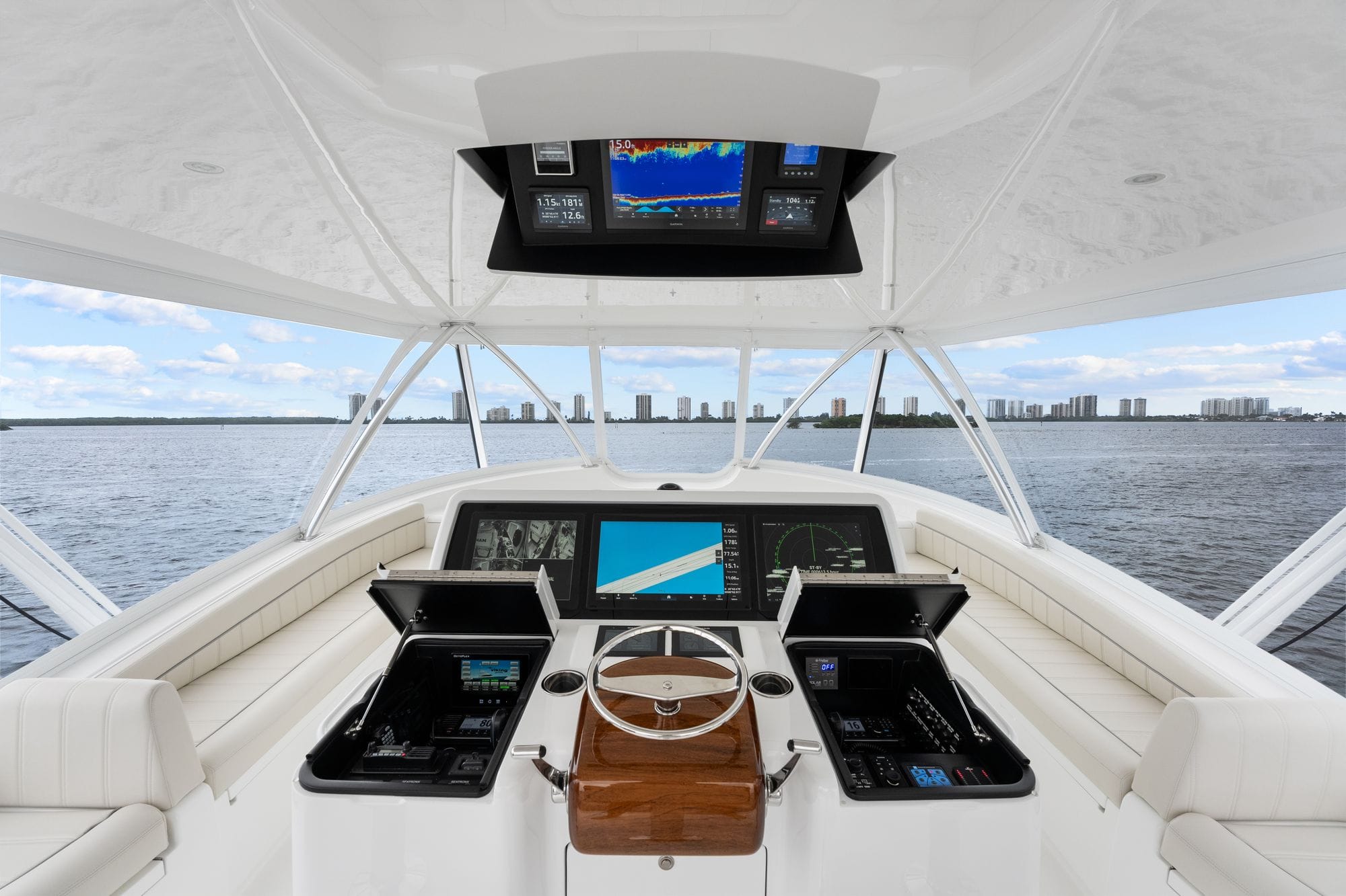 The flybridge helm with the teak helm pod